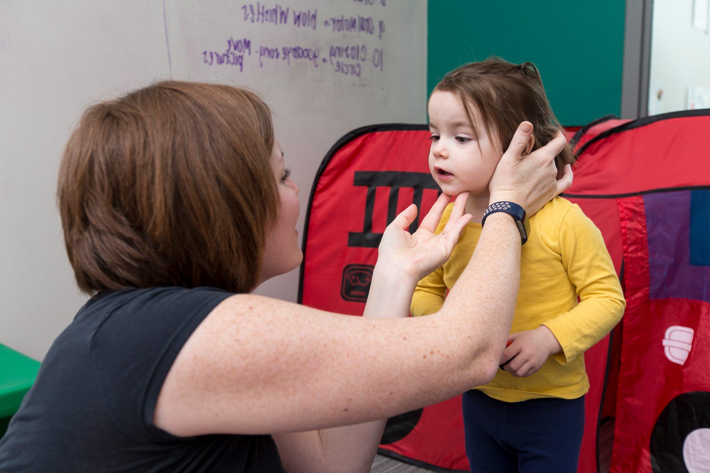 Communication Sciences and Disorders student working with Child